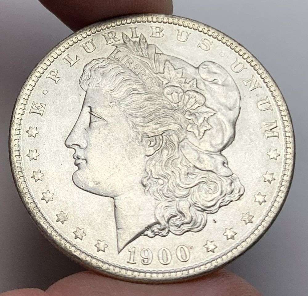 1900 Morgan Silver Dollar MS65: A very special consignment. Once in a great while, some really, really nice silver dollars will hit the market. These coins come from a old, old-timer! By order of the consignor, none of these coins a