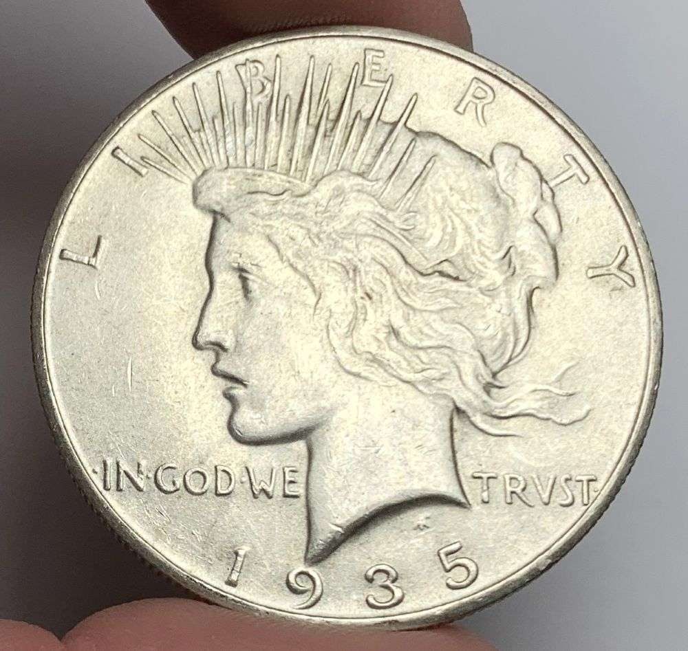 Last Minute! 1935-S Peace Silver Dollar MS63: Winner shall receive the exact coin shown here. (MR/RB)