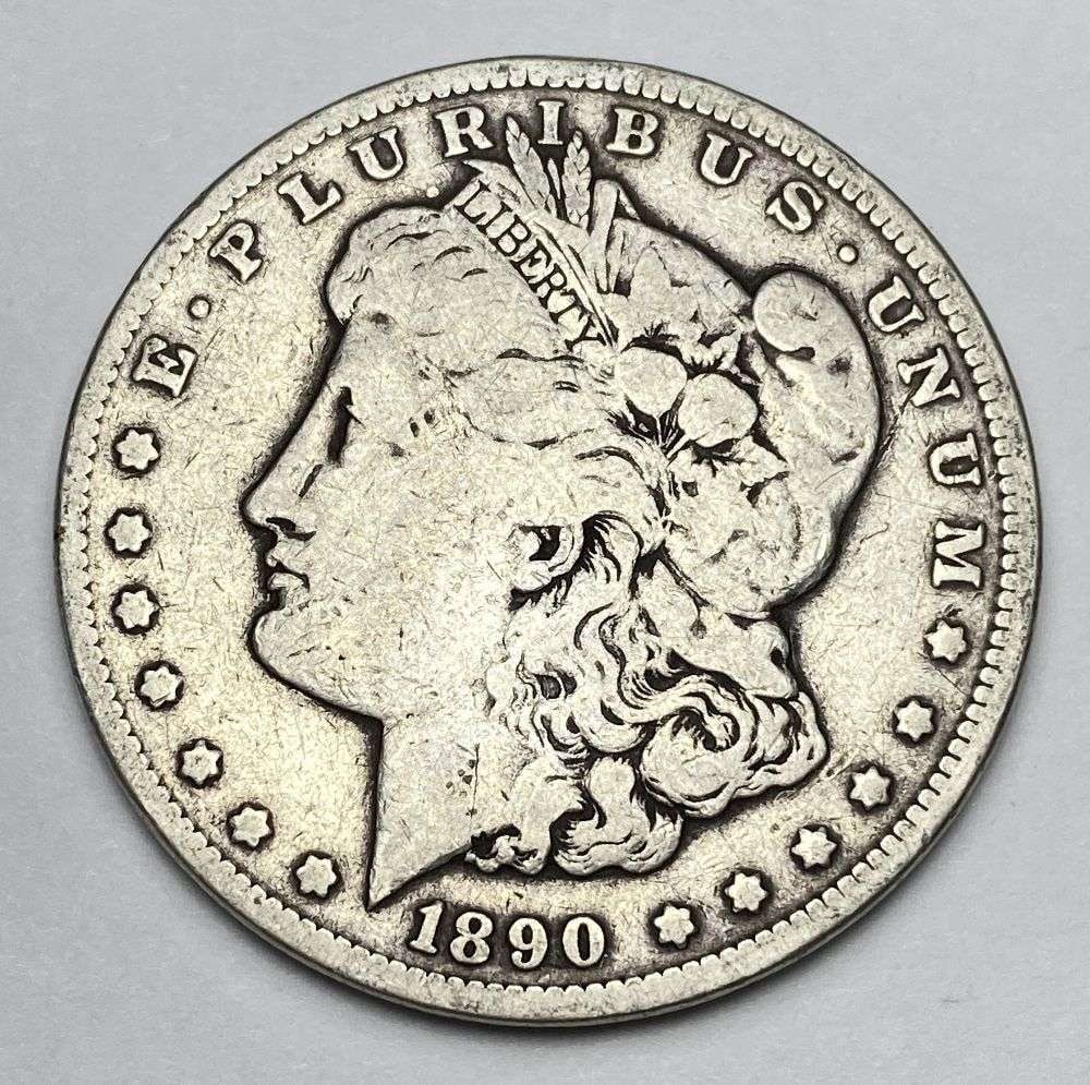 Last Minute! 1890-CC Morgan Silver Dollar VF: Winner shall receive the exact coin shown here. (RR/RB)