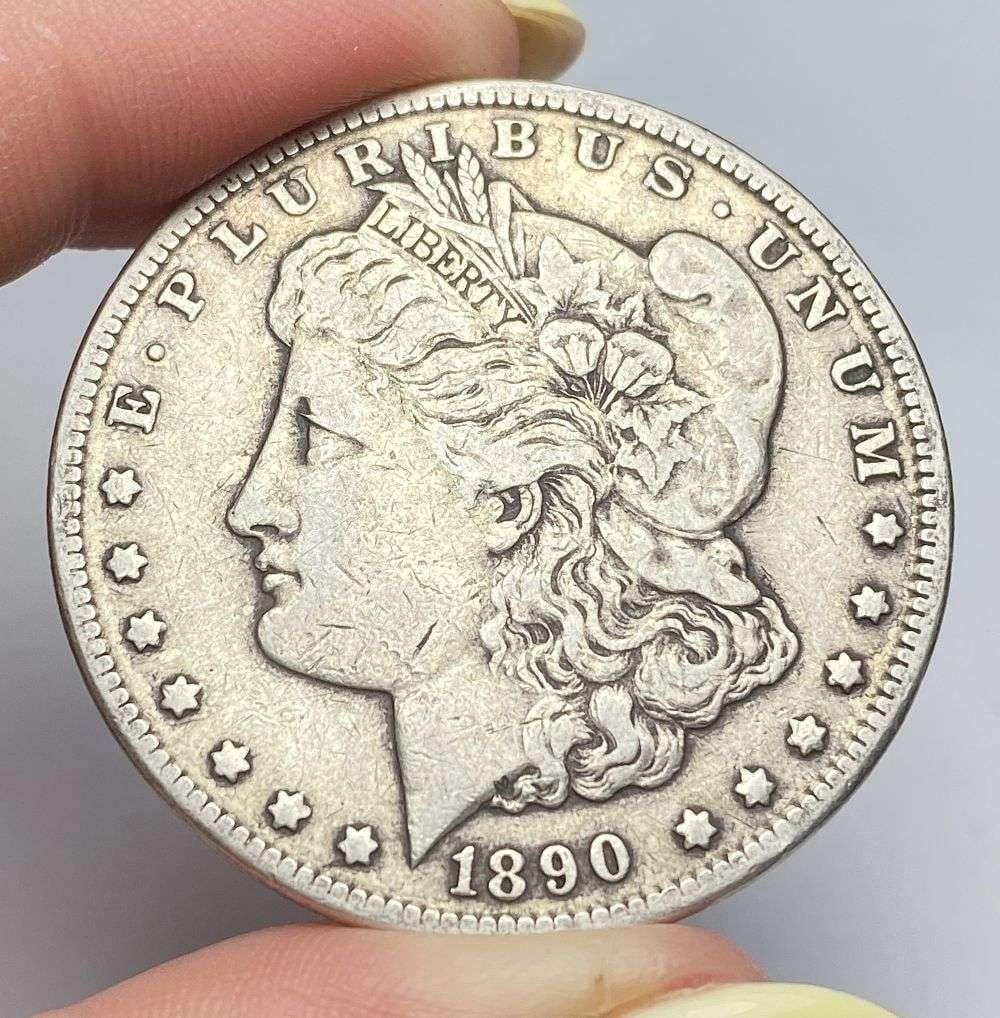 Last Minute! 1890-CC Morgan Silver Dollar VF: Winner shall receive the exact coin shown here. (RR/RB)