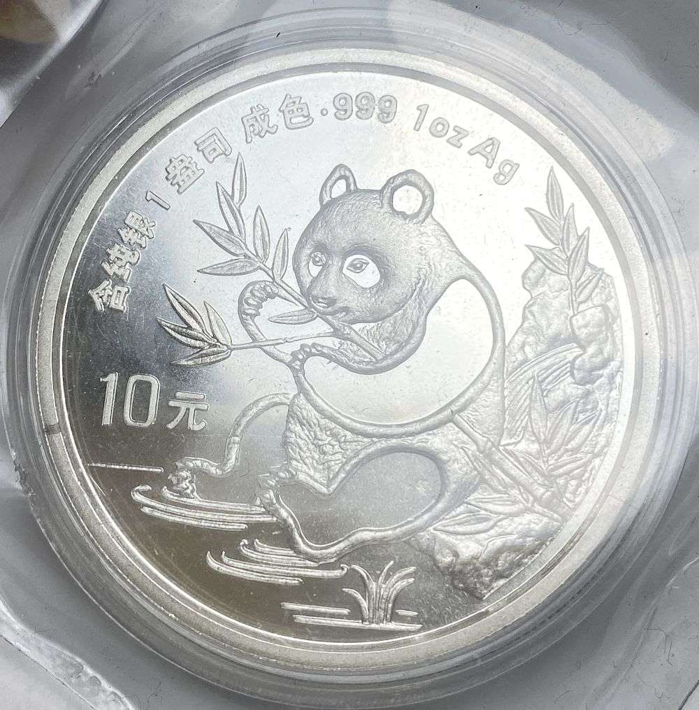 Rare Date 1991 Chinese Panda Proof 1 ozt .999 Silver Extremely High Grade Original Mint Packaging: Winner shall receive the exact coin shown here. (RR/RB)