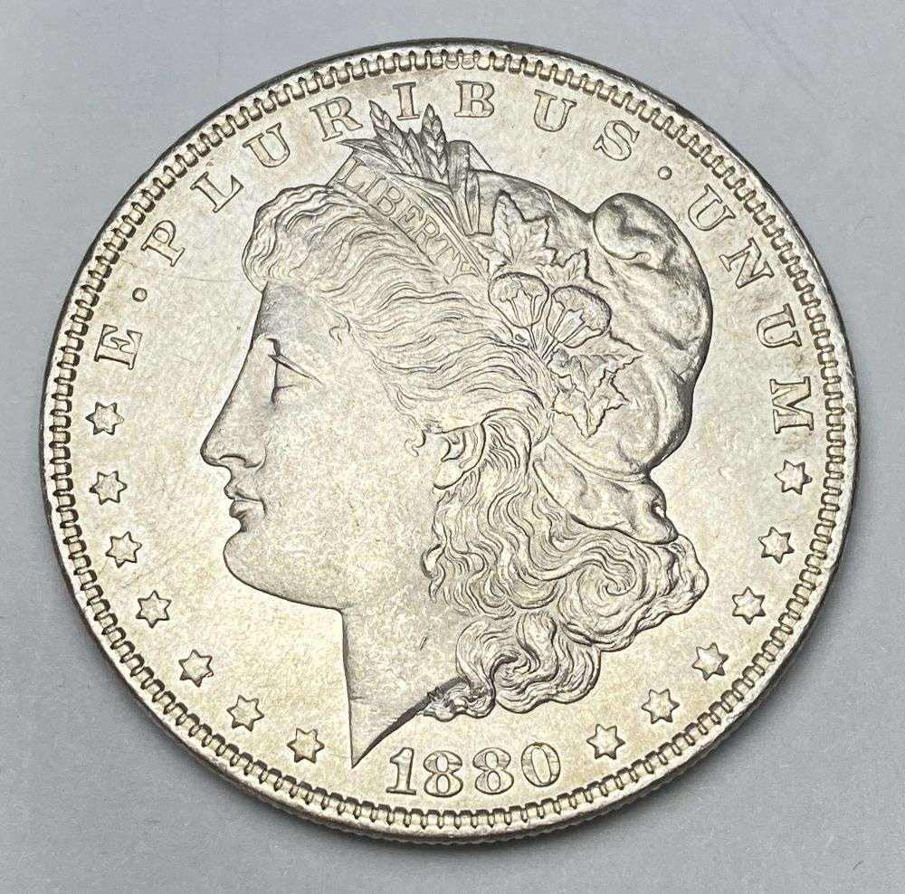 1880 Morgan Silver Dollar MS64: Winner shall receive the exact coin shown here. (RR/PB)