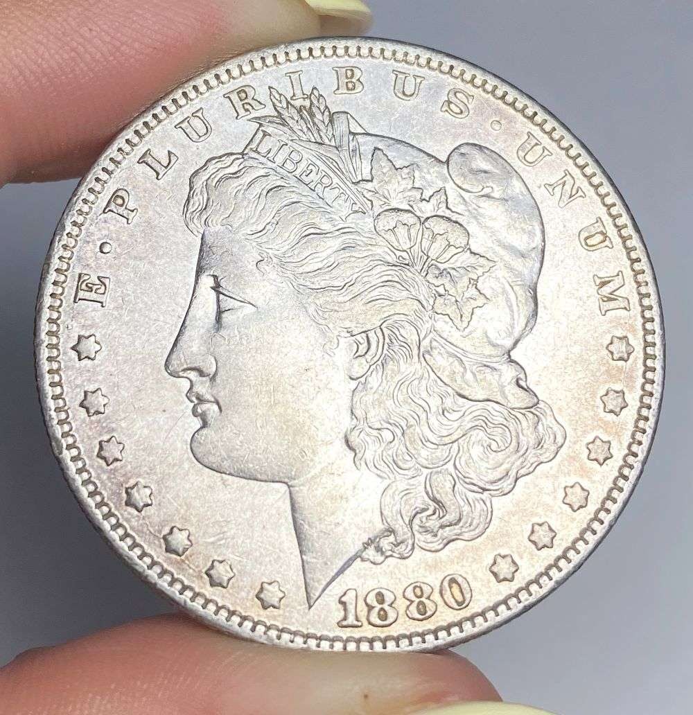 1880-O Morgan Silver Dollar MS62 Details: Winner shall receive the exact coin shown here. (RR/PB)