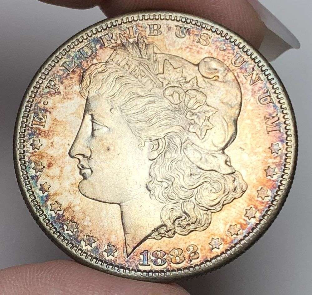 Toned 1882-S Morgan Silver Dollar MS66: This consignment, we hope to offer over time across our various Whatnot channels, with the best material featured in our Wednesday auctions. We hope to be done with this stuff by the beginning of 2027