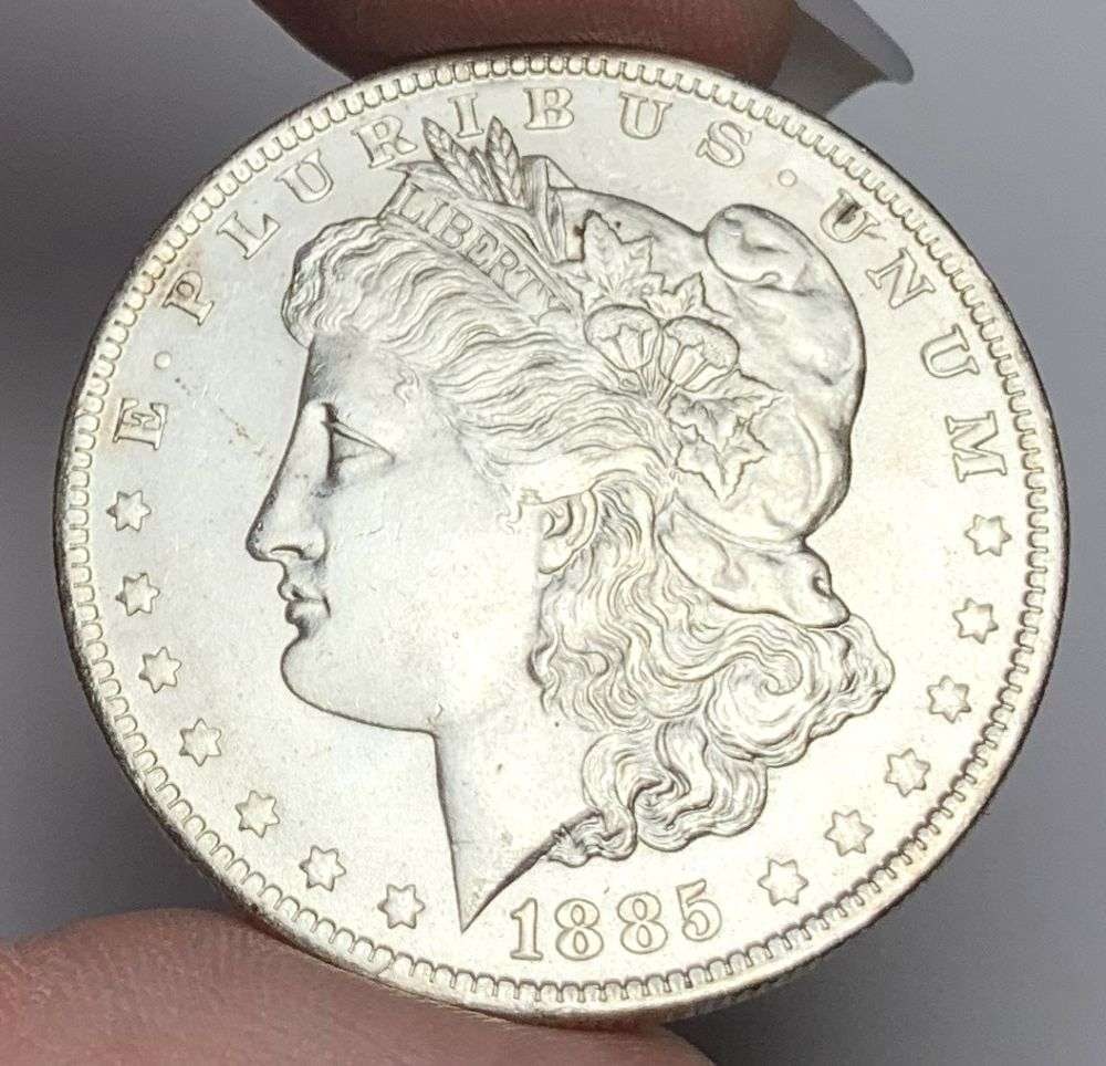 1885-O Morgan Silver Dollar MS64: This consignment, we hope to offer over time across our various Whatnot channels, with the best material featured in our Wednesday auctions. We hope to be done with this stuff by the beginning of 2027