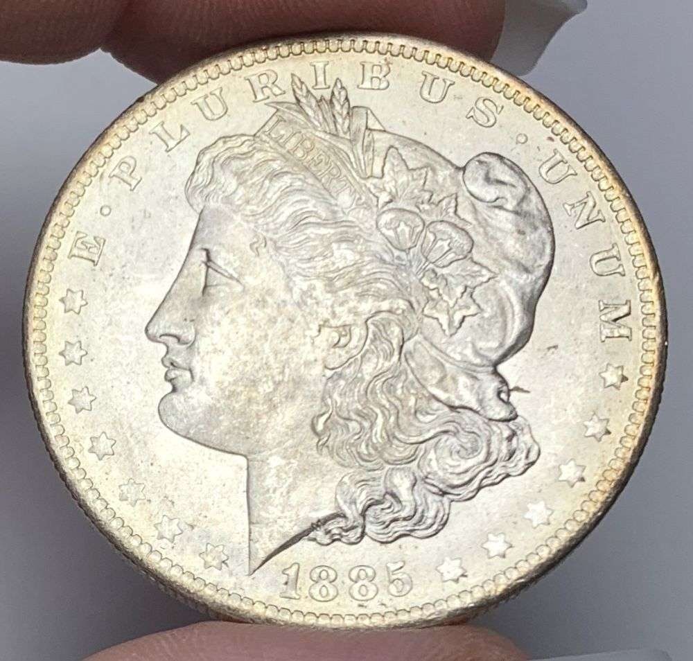 1885-O Morgan Silver Dollar MS65: This consignment, we hope to offer over time across our various Whatnot channels, with the best material featured in our Wednesday auctions. We hope to be done with this stuff by the beginning of 2027