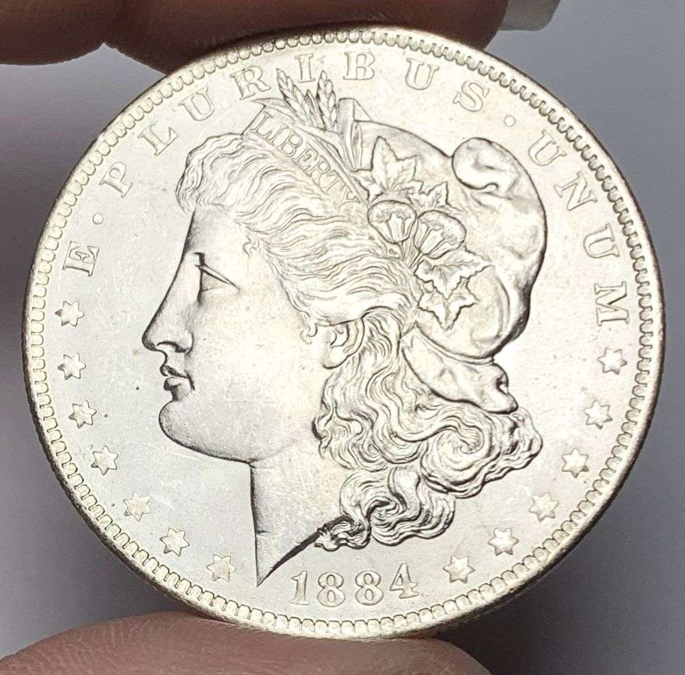 1884-O Morgan Silver Dollar MS66: This consignment, we hope to offer over time across our various Whatnot channels, with the best material featured in our Wednesday auctions. We hope to be done with this stuff by the beginning of 2027