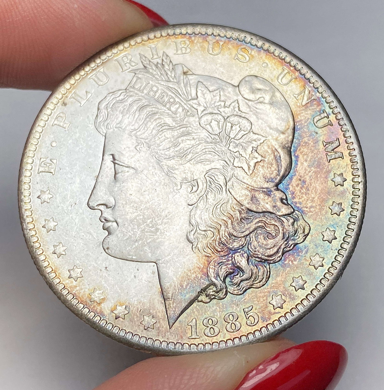 Toned 1885-O Morgan Silver Dollar MS64: This consignment, we hope to offer over time across our various Whatnot channels, with the best material featured in our Wednesday auctions. We hope to be done with this stuff by the beginning of 2027