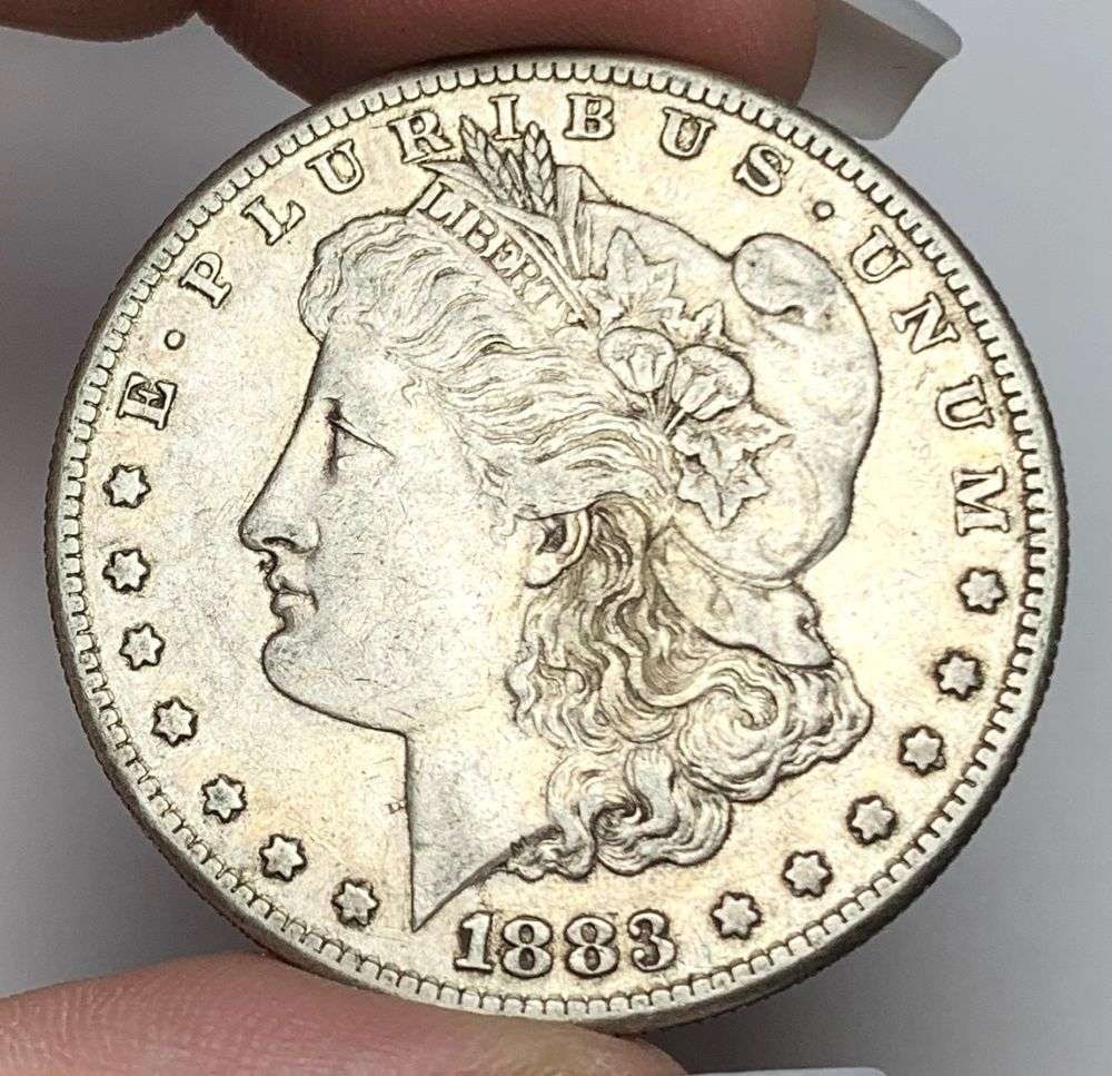 1883-S Morgan Silver Dollar AU53: This consignment, we hope to offer over time across our various Whatnot channels, with the best material featured in our Wednesday auctions. We hope to be done with this stuff by the beginning of 2027
