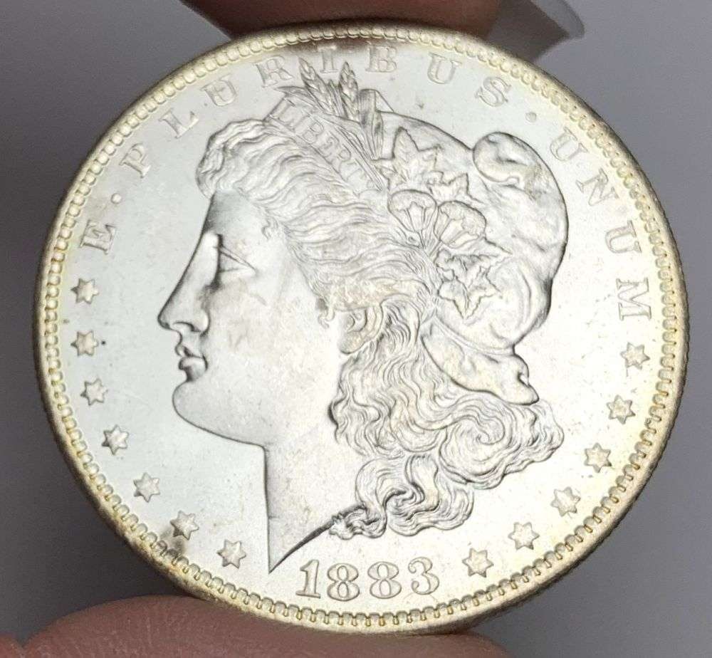 1883-O Morgan Silver Dollar MS65: This consignment, we hope to offer over time across our various Whatnot channels, with the best material featured in our Wednesday auctions. We hope to be done with this stuff by the beginning of 2027
