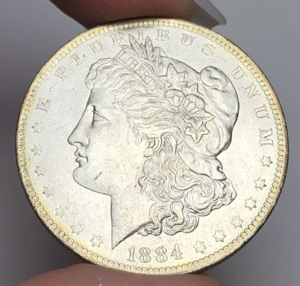 1884-O Morgan Silver Dollar MS65: This consignment, we hope to offer over time across our various Whatnot channels, with the best material featured in our Wednesday auctions. We hope to be done with this stuff by the beginning of 2027