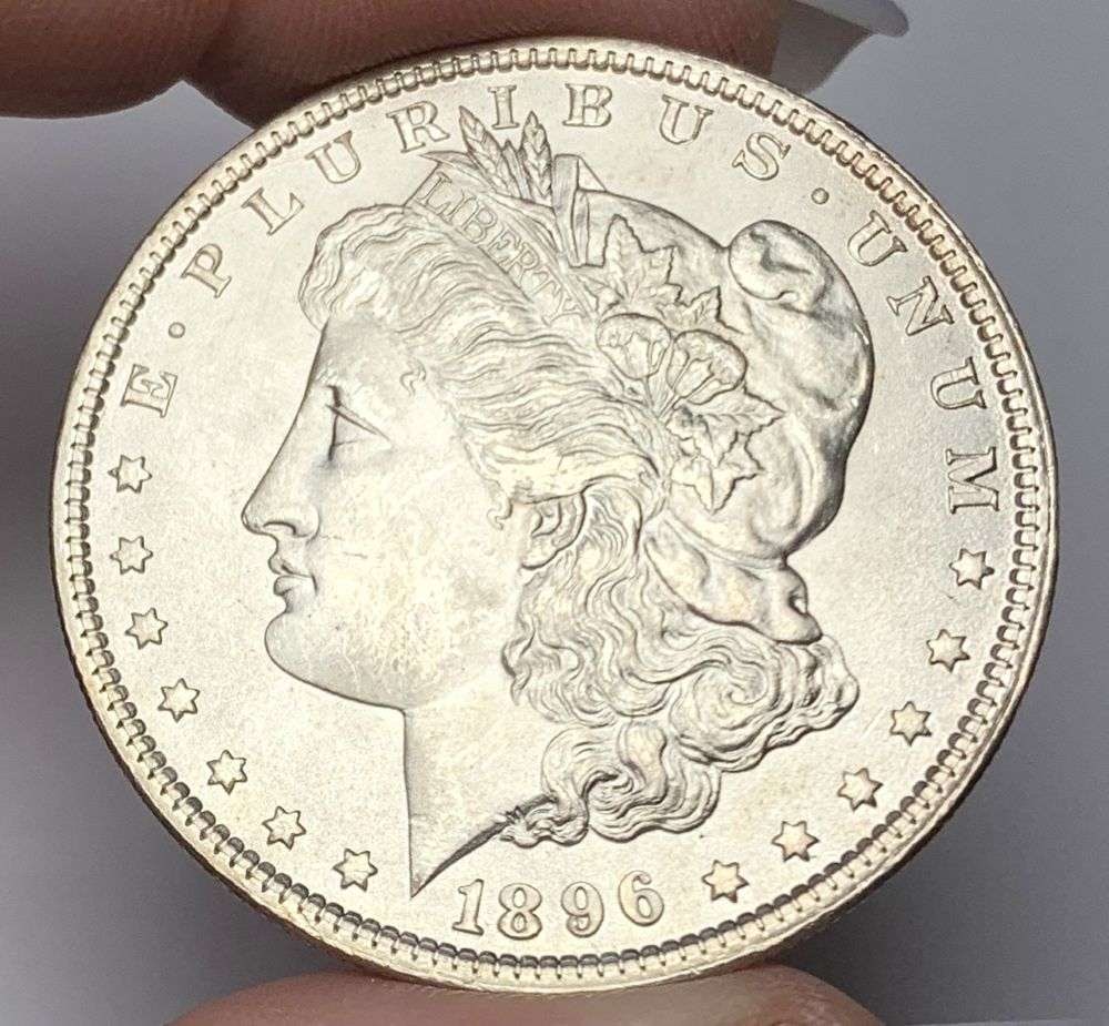 1896 Morgan Silver Dollar MS65: This consignment, we hope to offer over time across our various Whatnot channels, with the best material featured in our Wednesday auctions. We hope to be done with this stuff by the beginning of 2027