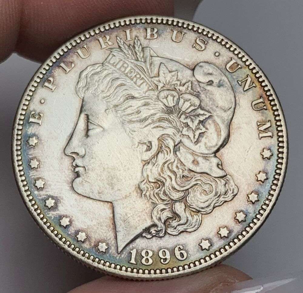 1896-O Morgan Silver Dollar AU Details: This consignment, we hope to offer over time across our various Whatnot channels, with the best material featured in our Wednesday auctions. We hope to be done with this stuff by the beginning of 2027