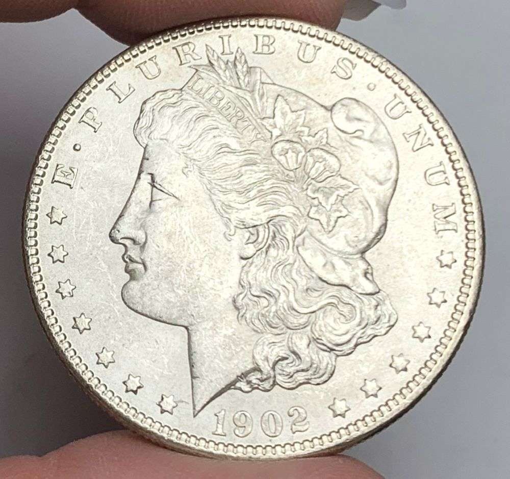 1902-O Morgan Silver Dollar MS63: This consignment, we hope to offer over time across our various Whatnot channels, with the best material featured in our Wednesday auctions. We hope to be done with this stuff by the beginning of 2027