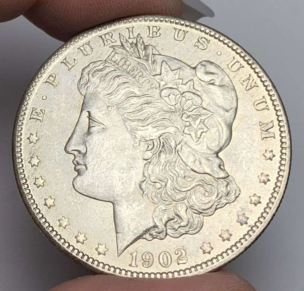 1902-O Morgan Silver Dollar MS64: This consignment, we hope to offer over time across our various Whatnot channels, with the best material featured in our Wednesday auctions. We hope to be done with this stuff by the beginning of 2027