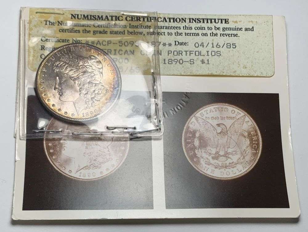 Vintage 1985 Grading Certified NCI 1890-S Morgan Silver Dollar MS65: By today's standards, these coins would grade an average of one to two grades higher than the old 1985 NCI grading. NCI was a wholly owned, top secret division of heritage auctions, yes the same folks