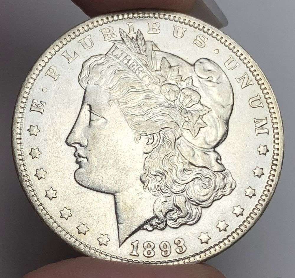 Key date 1893 Morgan Silver Dollar AU58: Winner shall receive the exact coin shown here. (MR/RBB)