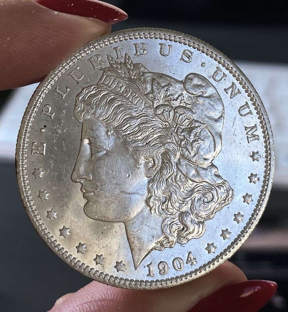 1904-O Morgan Silver Dollar MS64 PL: This consignment, we hope to offer over time across our various Whatnot channels, with the best material featured in our Wednesday auctions. We hope to be done with this stuff by the beginning of 2027