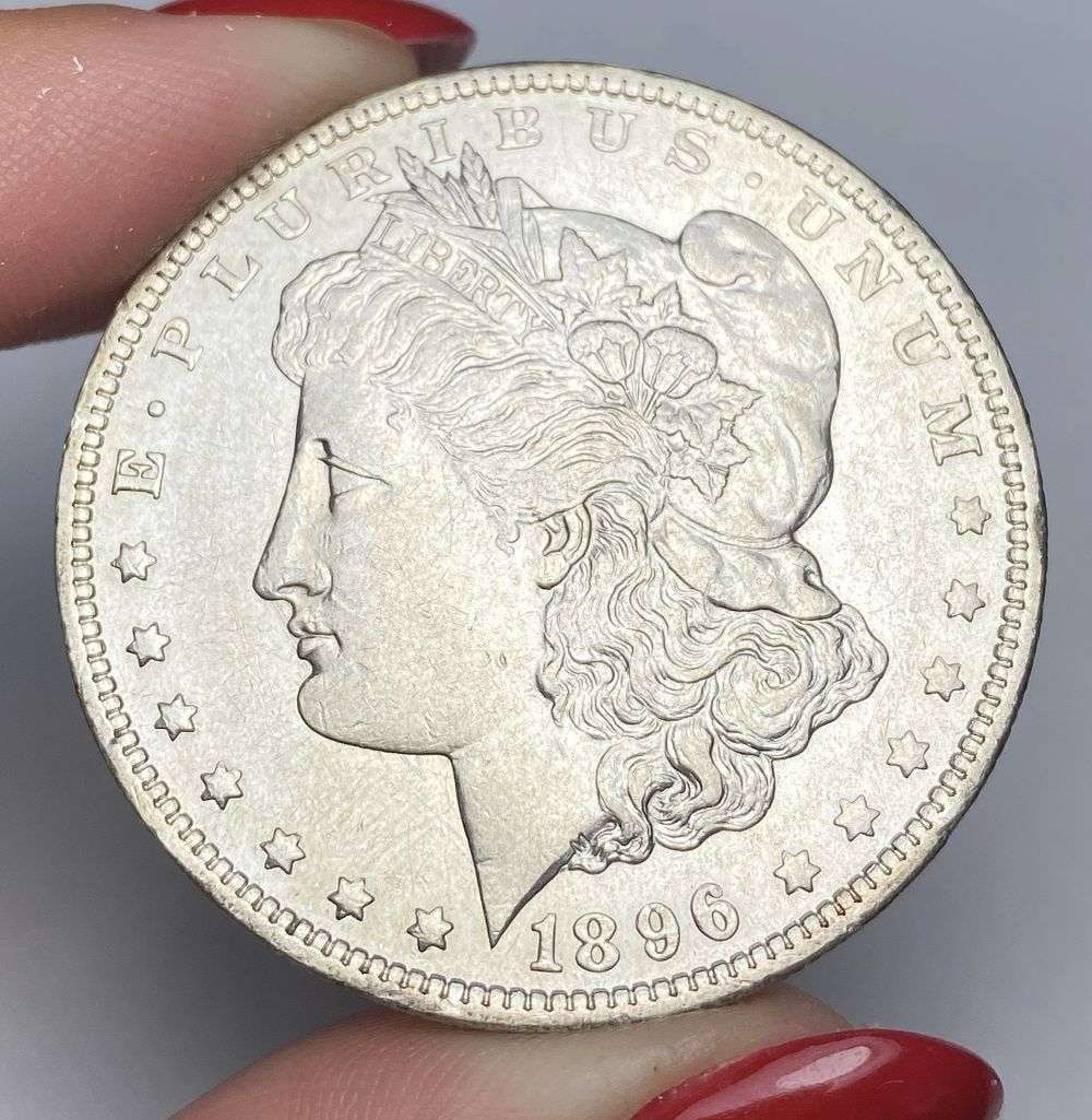 1896-O Morgan Silver Dollar AU58: This consignment, we hope to offer over time across our various Whatnot channels, with the best material featured in our Wednesday auctions. We hope to be done with this stuff by the beginning of 2027