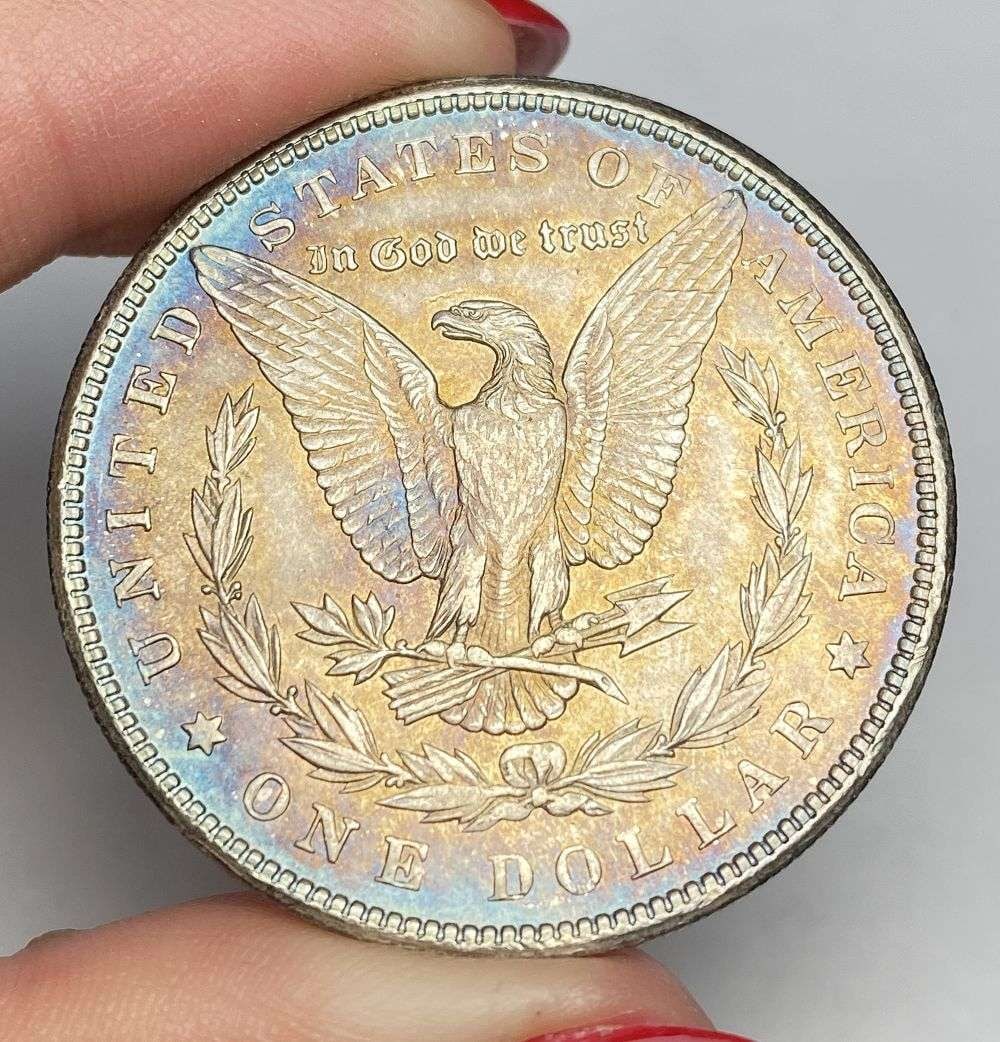 Toned 1900 Morgan Silver Dollar MS65: This consignment, we hope to offer over time across our various Whatnot channels, with the best material featured in our Wednesday auctions. We hope to be done with this stuff by the beginning of 2027