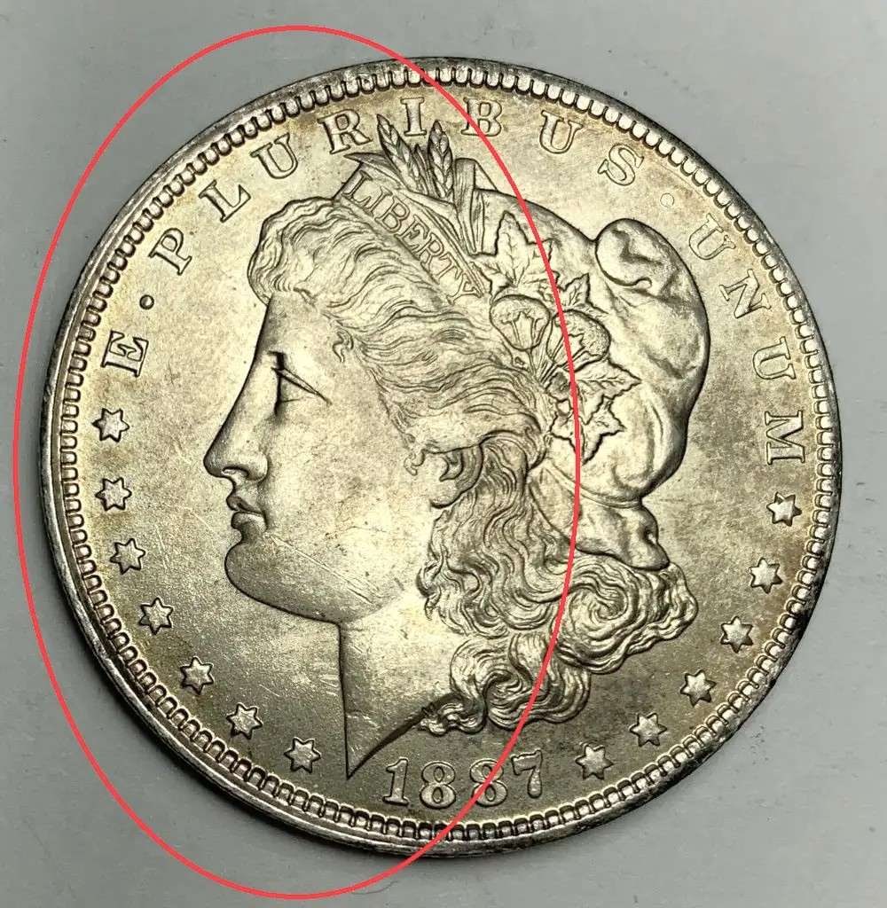 Off Center 1887-O Morgan Silver Dollar MS65: A very special consignment. Once in a great while, some really, really nice silver dollars will hit the market. These coins come from a old, old-timer! By order of the consignor, none of these coins a