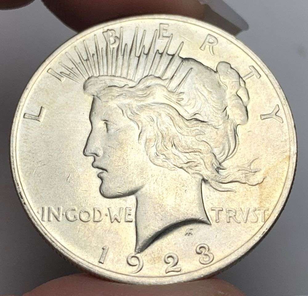 1923 Peace Silver Dollar MS65: Winner shall receive the exact coin shown here. (MR/RB)