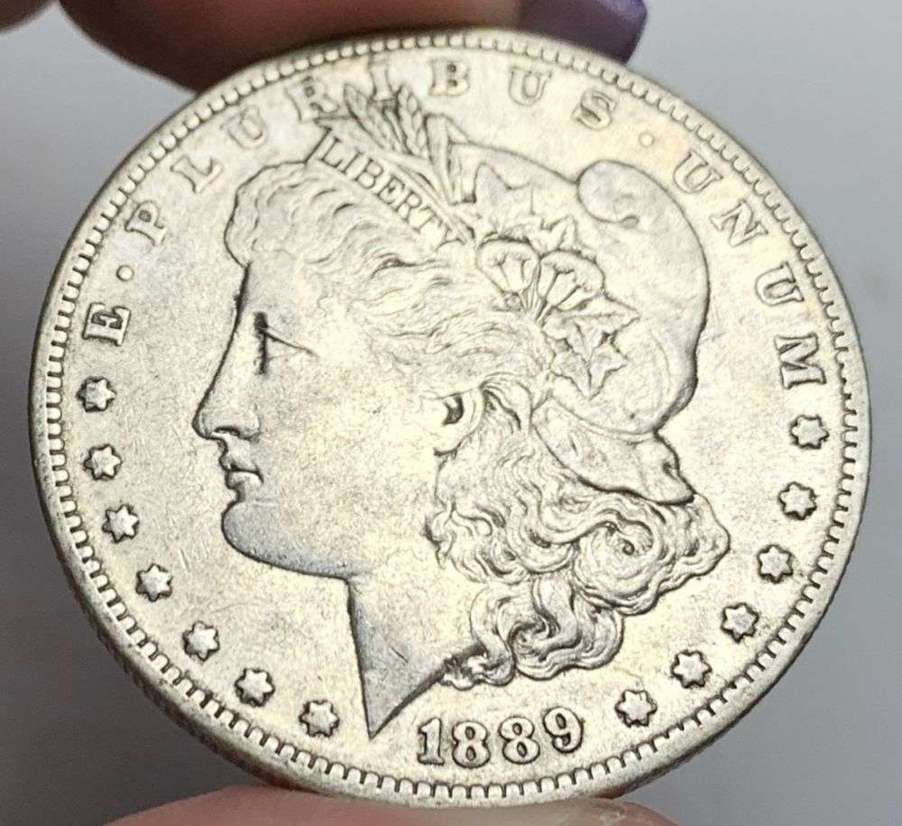 1889-O Morgan Silver Dollar AU (1 of 3)