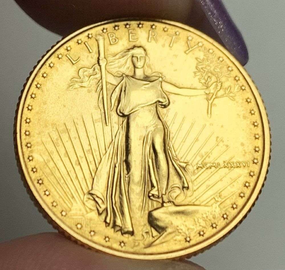 Last Minute Gold! Rare Roman Numeral First Year 1986 American $10 Gold Eagle 1/4 ozt: We were recently visited by some old friends who were selling us a collection they had originally purchased from us, much of it decades ago. Winner shall receive the exact coin shown here. (MR/B)
