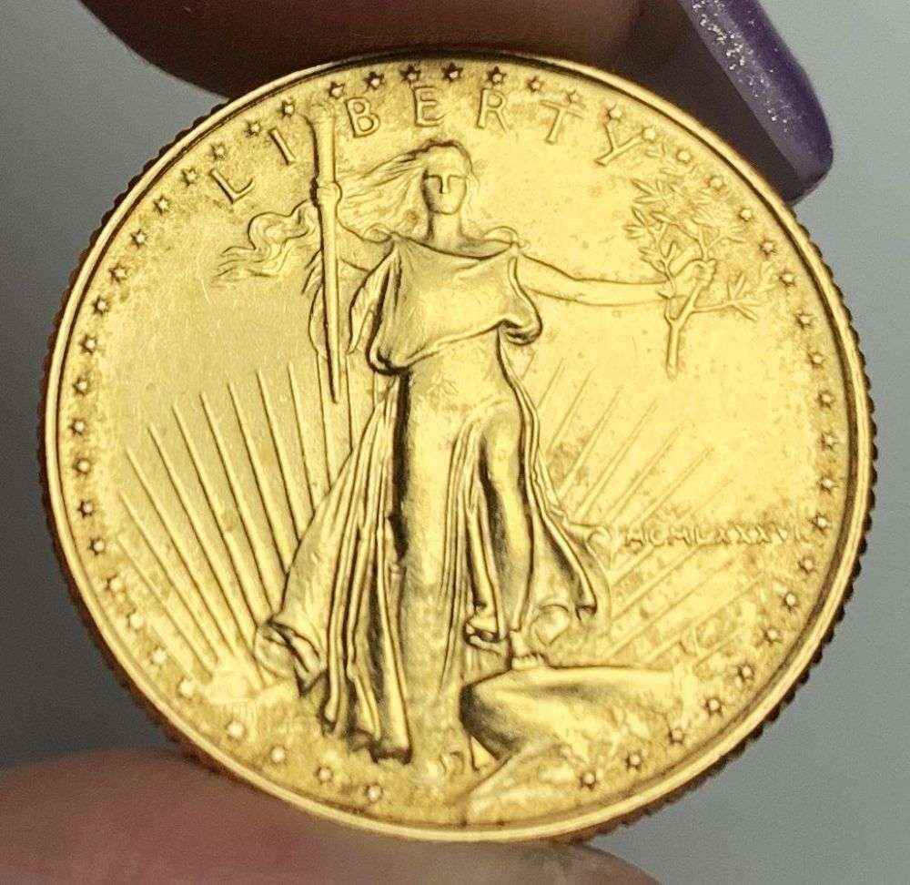 Last Minute Gold! Rare Roman Numeral First Year 1986 American $10 Gold Eagle 1/4 ozt: We were recently visited by some old friends who were selling us a collection they had originally purchased from us, much of it decades ago. Winner shall receive the exact coin shown here. (MR/B)