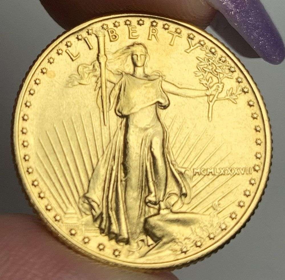 Last Minute Gold! Rare Roman Numeral 1987 American $10 Gold Eagle 1/4 ozt: We were recently visited by some old friends who were selling us a collection they had originally purchased from us, much of it decades ago. Winner shall receive the exact coin shown here. (MR/B)