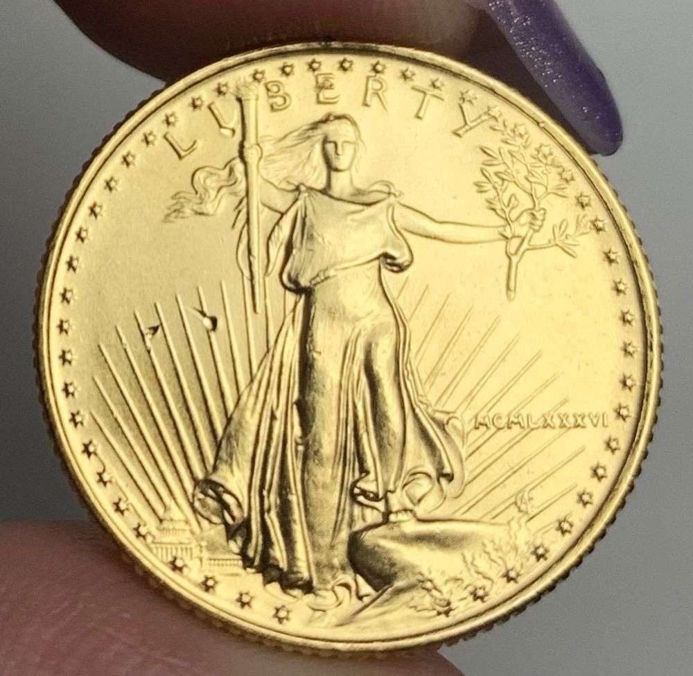 Last Minute Gold! Rare Roman Numeral First Year 1986 American $10 Gold Eagle 1/4 ozt: We were recently visited by some old friends who were selling us a collection they had originally purchased from us, much of it decades ago. Winner shall receive the exact coin shown here. (MR/B)