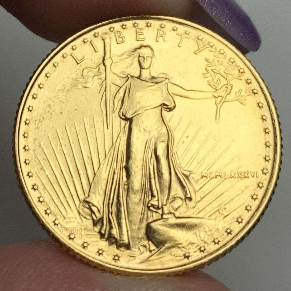 Last Minute Gold! Rare Roman Numeral First Year 1986 American $10 Gold Eagle 1/4 ozt: We were recently visited by some old friends who were selling us a collection they had originally purchased from us, much of it decades ago. Winner shall receive the exact coin shown here. (MR/B)