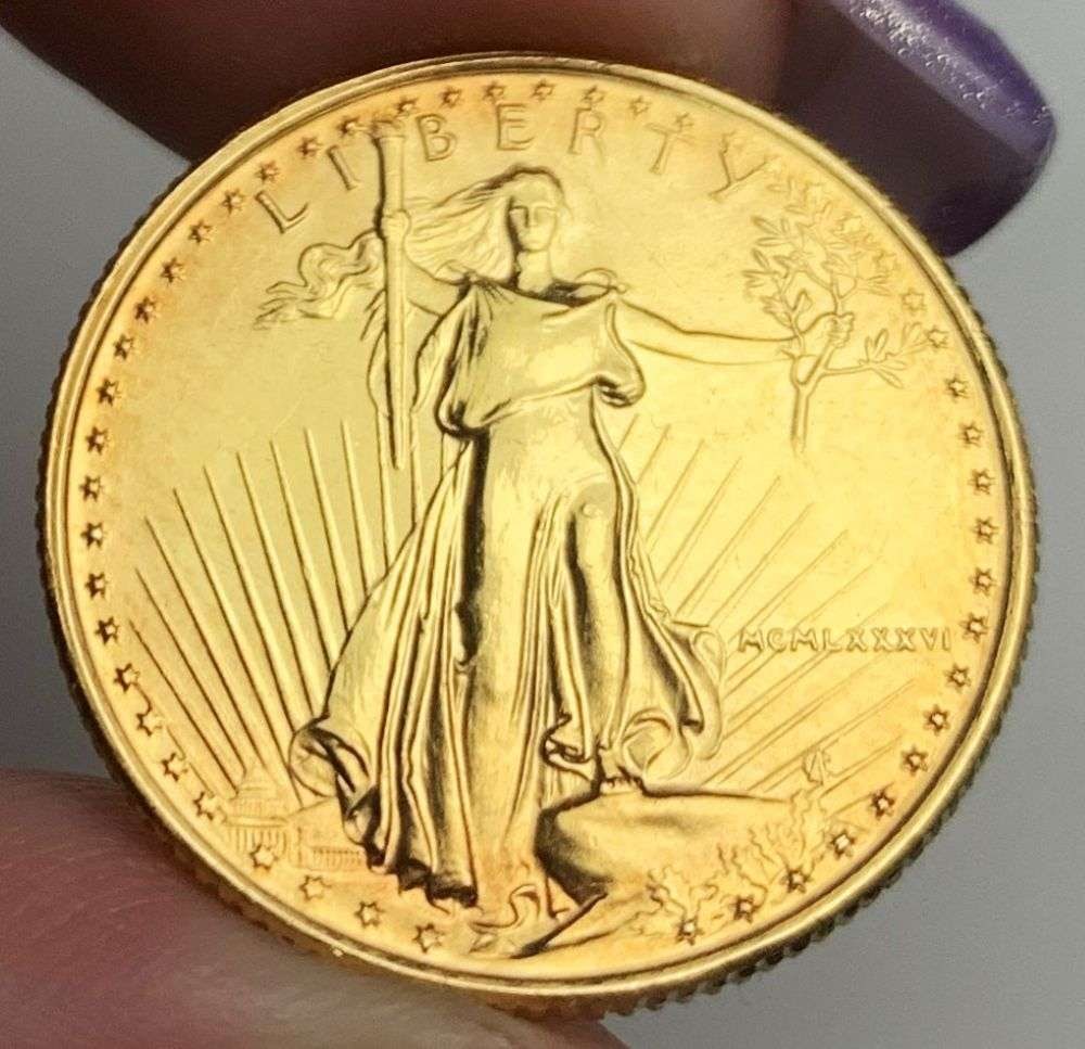 Last Minute Gold! Rare Roman Numeral First Year 1986 American $10 Gold Eagle 1/4 ozt: We were recently visited by some old friends who were selling us a collection they had originally purchased from us, much of it decades ago. Winner shall receive the exact coin shown here. (MR/B)
