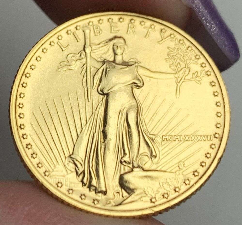 Last Minute Gold! Rare Roman Numeral 1987 American $10 Gold Eagle 1/4 ozt: We were recently visited by some old friends who were selling us a collection they had originally purchased from us, much of it decades ago. Winner shall receive the exact coin shown here. (MR/B)