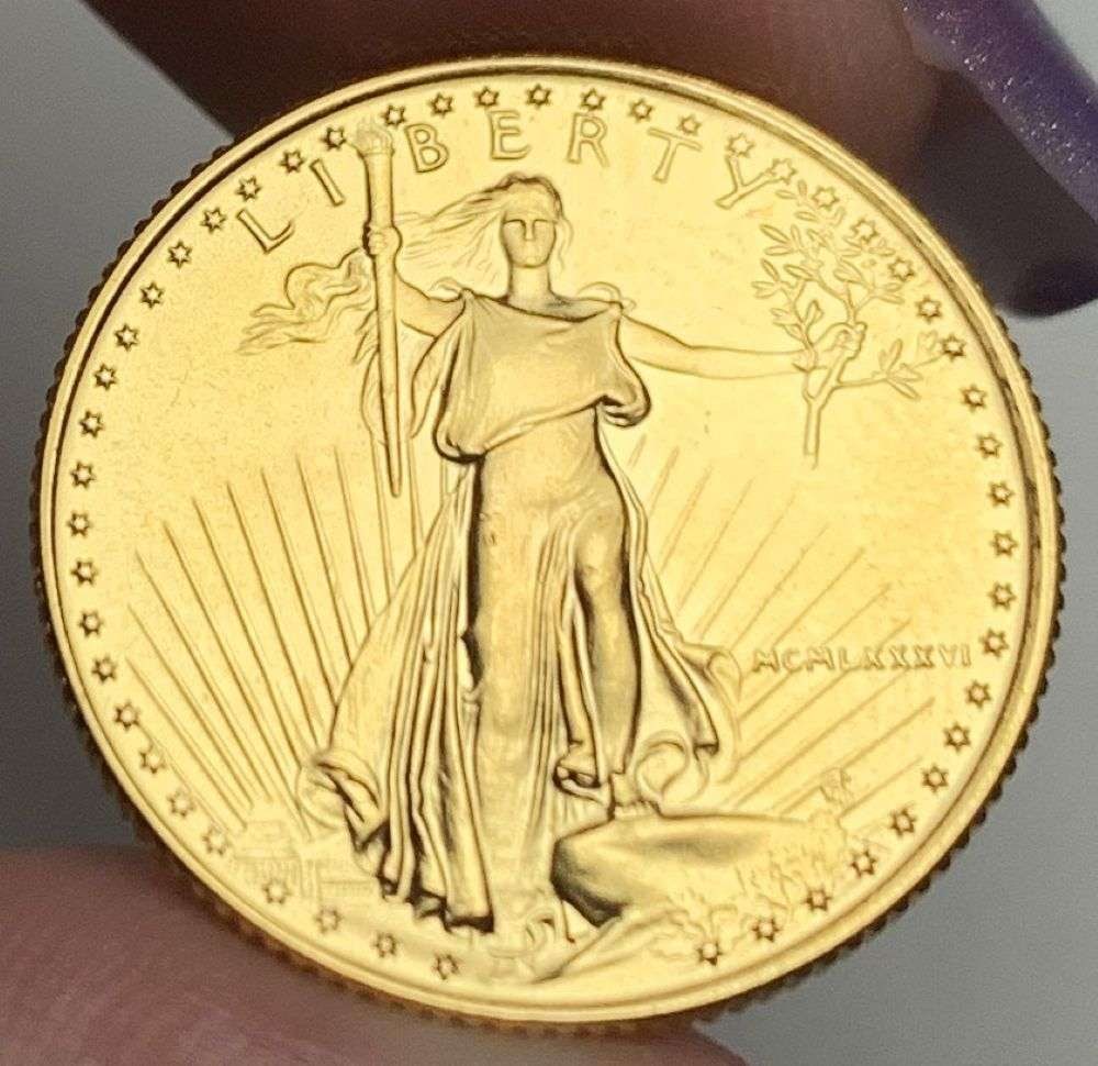 Last Minute Gold! Rare Roman Numeral First Year 1986 American $10 Gold Eagle 1/4 ozt: We were recently visited by some old friends who were selling us a collection they had originally purchased from us, much of it decades ago. Winner shall receive the exact coin shown here. (MR/B)