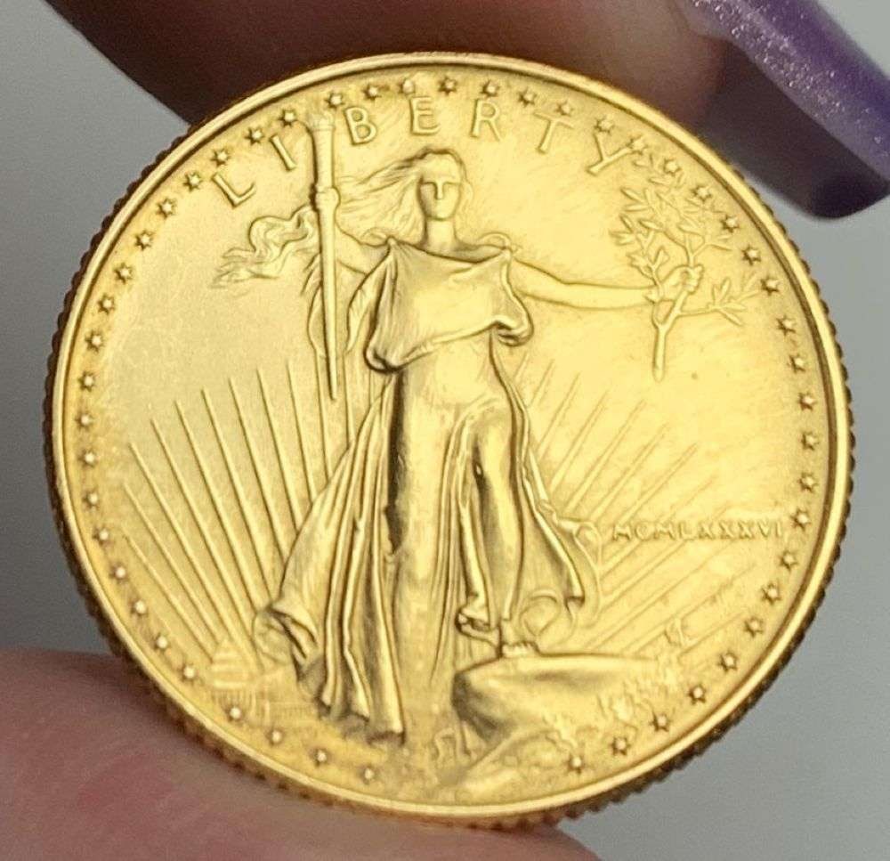 Last Minute Gold! Rare Roman Numeral First Year 1986 American $10 Gold Eagle 1/4 ozt: We were recently visited by some old friends who were selling us a collection they had originally purchased from us, much of it decades ago. Winner shall receive the exact coin shown here. (MR/B)