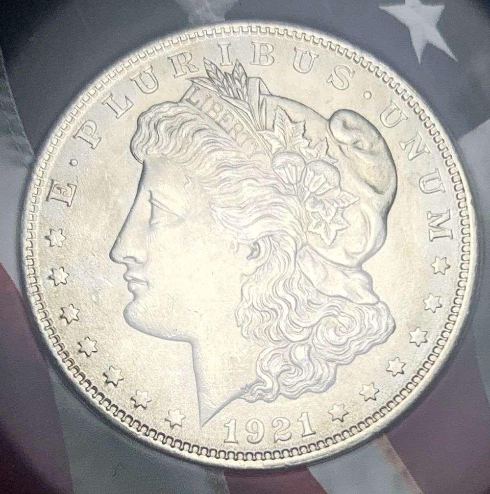 Last Minute! 1921 Morgan Silver Dollar MS64 American Flag Holder: A very special consignment. Once in a great while, some really, really nice silver dollars will hit the market. These coins come from a old, old-timer! By order of the consignor, none of these coins a