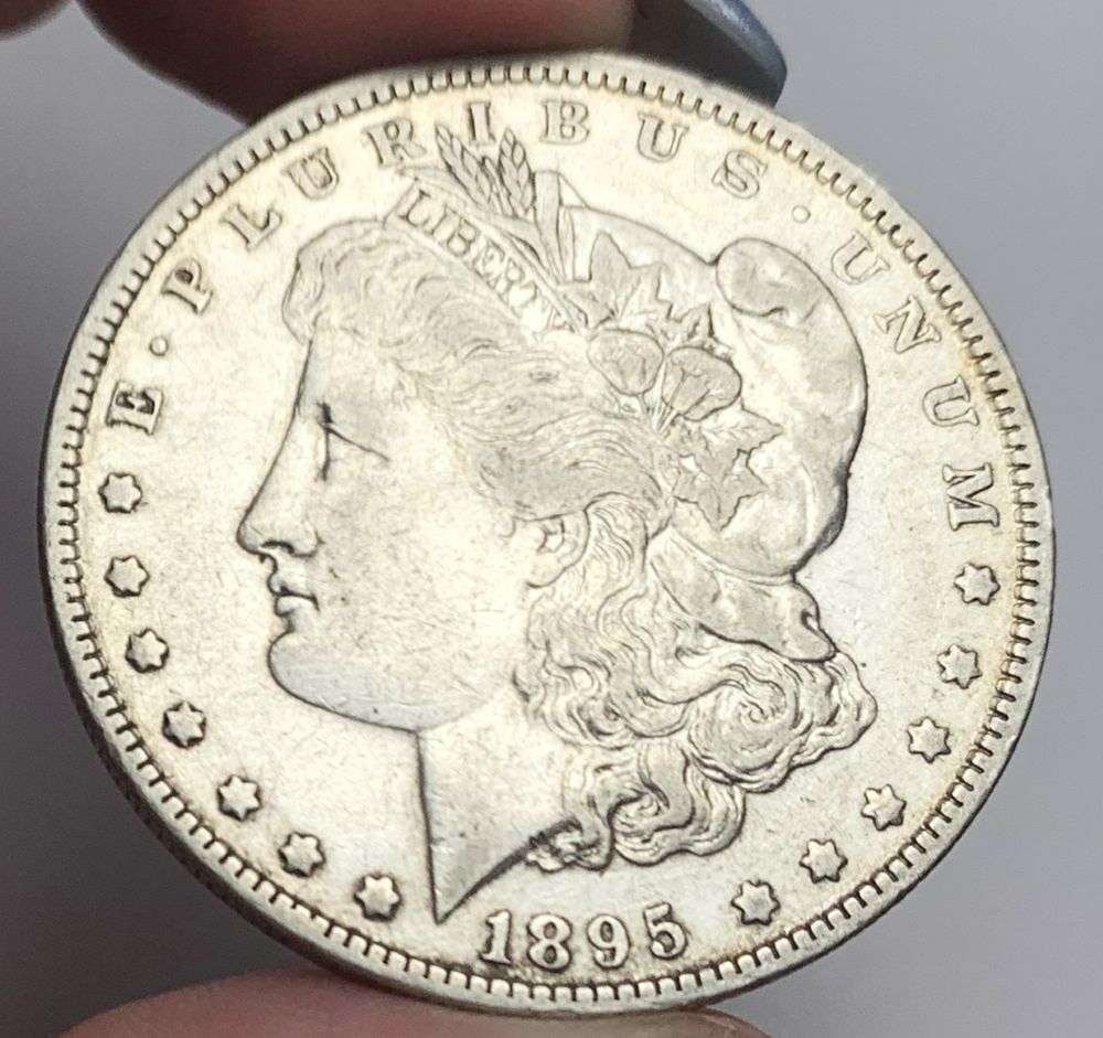 Last Minute! 1895-O Morgan Silver Dollar VF30+: A very special consignment. Once in a great while, some really, really nice silver dollars will hit the market. These coins come from a old, old-timer! By order of the consignor, none of these coins a