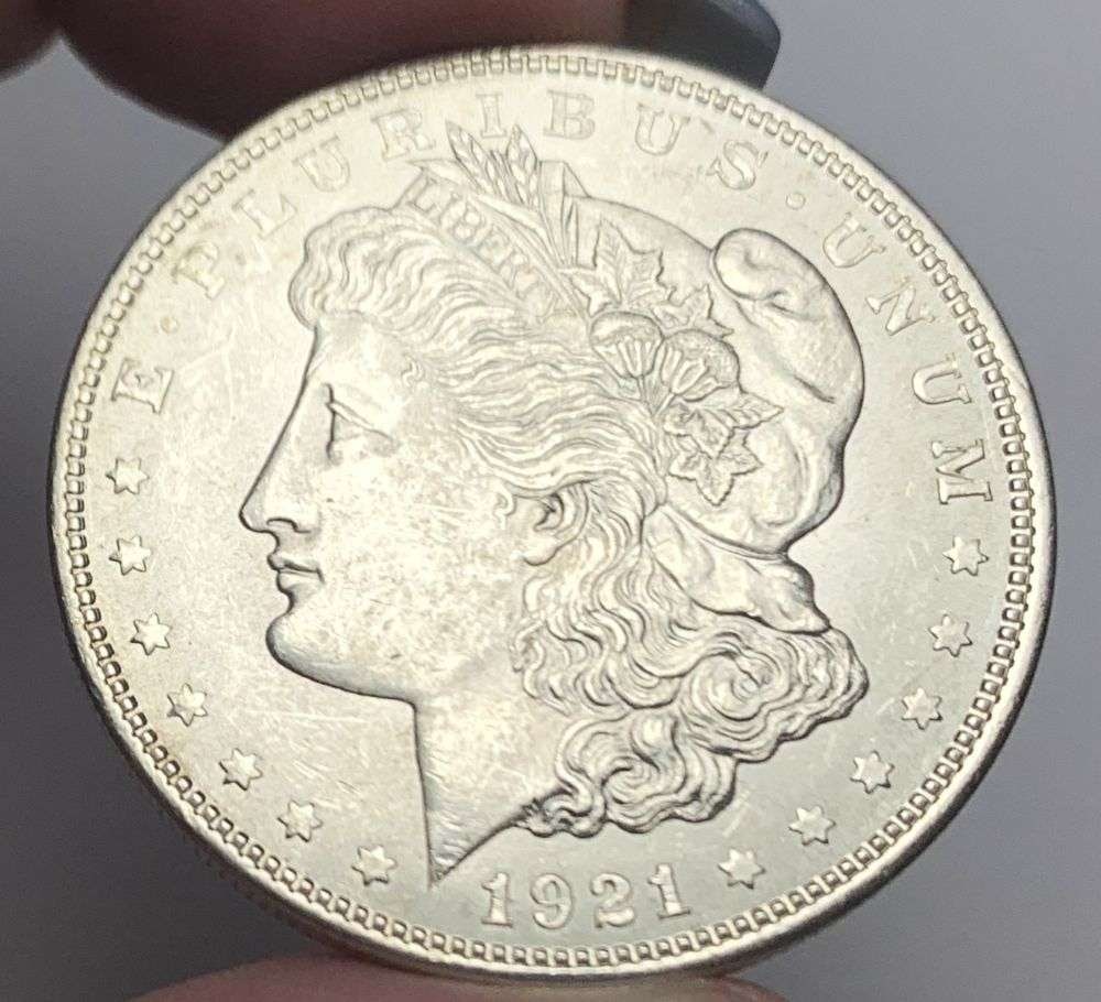 Last Minute! 1921 Morgan Silver Dollar MS63: A very special consignment. Once in a great while, some really, really nice silver dollars will hit the market. These coins come from a old, old-timer! By order of the consignor, none of these coins a