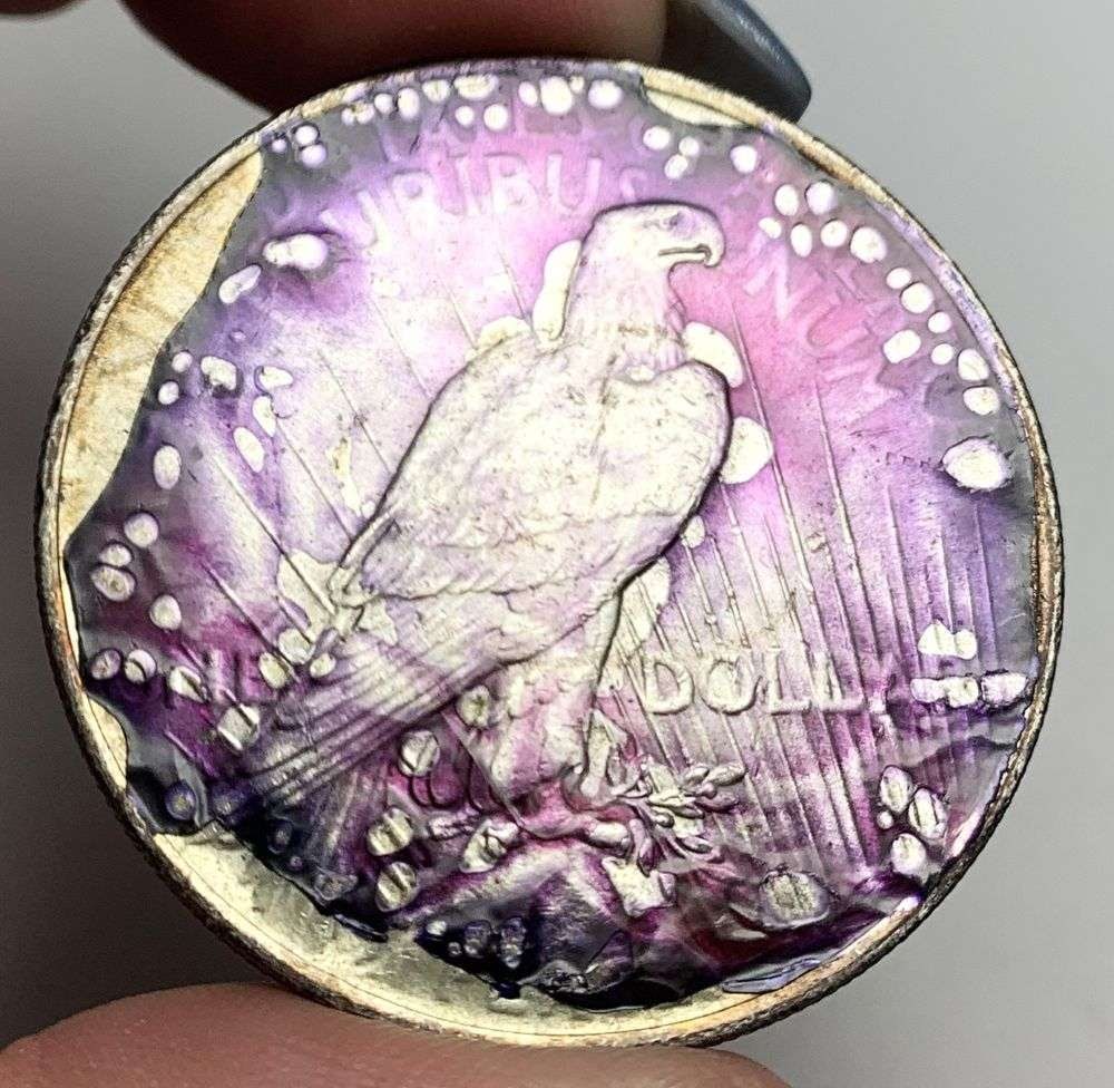 Last Minute! Purple Haze 1928 Peace Silver Dollar: A very special consignment. Once in a great while, some really, really nice silver dollars will hit the market. These coins come from a old, old-timer! By order of the consignor, none of these coins a