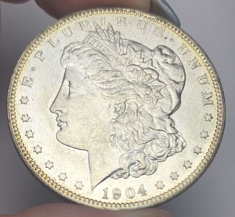 1904-O Morgan Silver Dollar MS65: This consignment, we hope to offer over time across our various Whatnot channels, with the best material featured in our Wednesday auctions. We hope to be done with this stuff by the beginning of 2027
