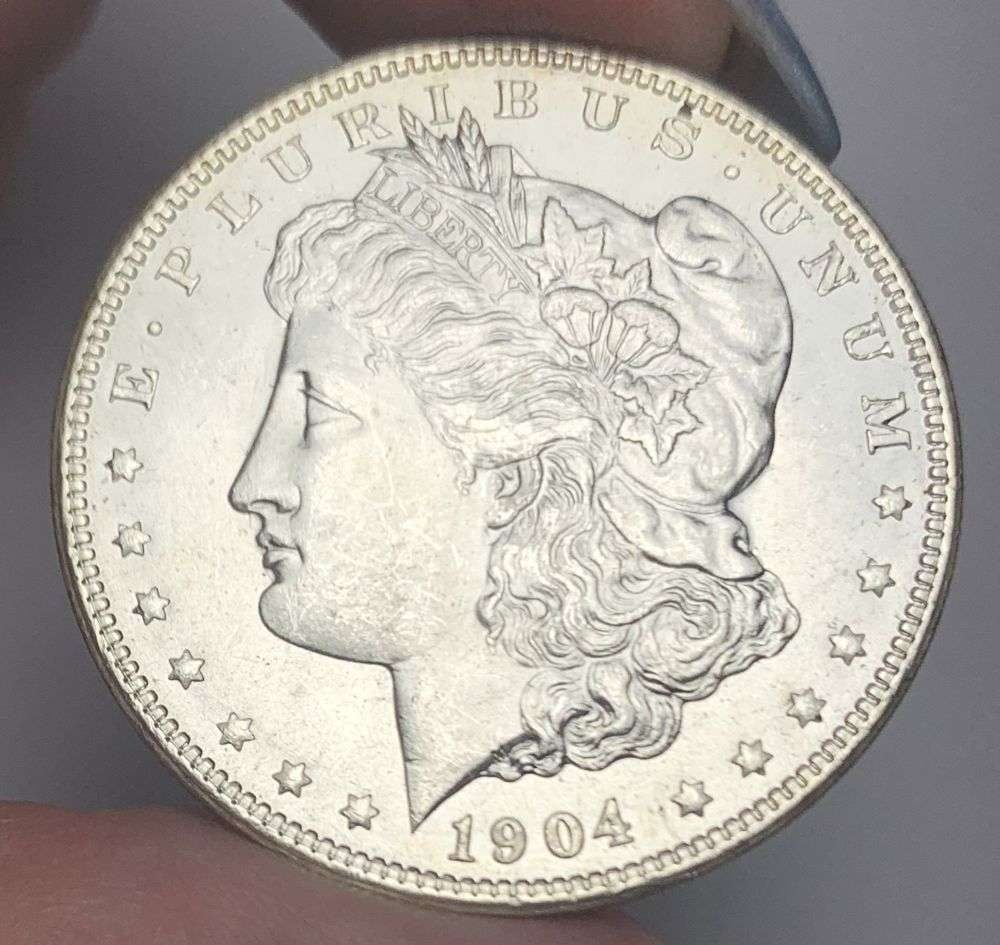 1904-O Morgan Silver Dollar MS65: This consignment, we hope to offer over time across our various Whatnot channels, with the best material featured in our Wednesday auctions. We hope to be done with this stuff by the beginning of 2027