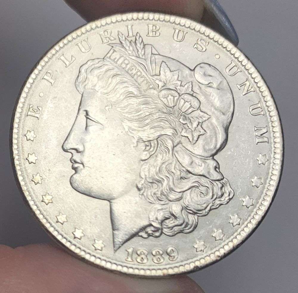1889 Morgan Silver Dollar MS65: This consignment, we hope to offer over time across our various Whatnot channels, with the best material featured in our Wednesday auctions. We hope to be done with this stuff by the beginning of 2027