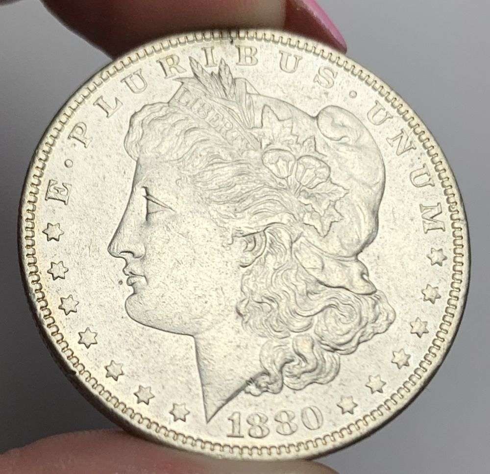 1880-O Morgan Silver Dollar MS63 Details: This consignment, we hope to offer over time across our various Whatnot channels, with the best material featured in our Wednesday auctions. We hope to be done with this stuff by the beginning of 2027