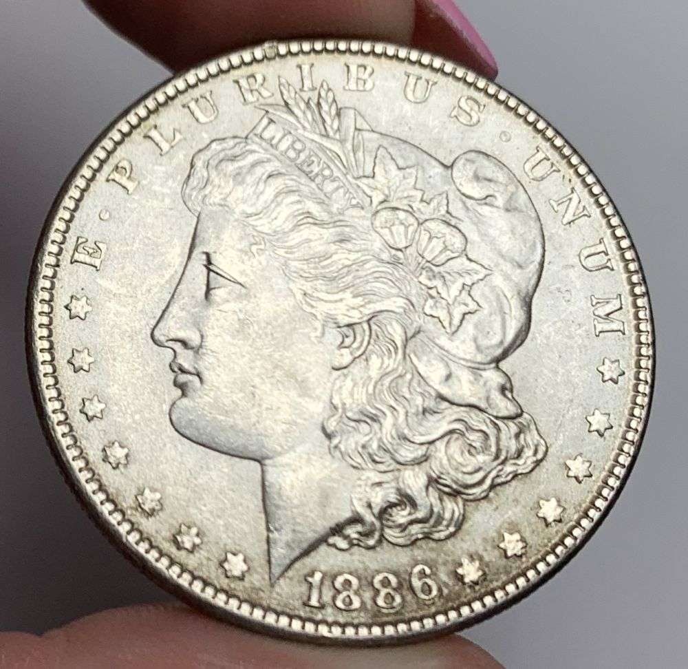 1886 Morgan Silver Dollar MS64: This consignment, we hope to offer over time across our various Whatnot channels, with the best material featured in our Wednesday auctions. We hope to be done with this stuff by the beginning of 2027