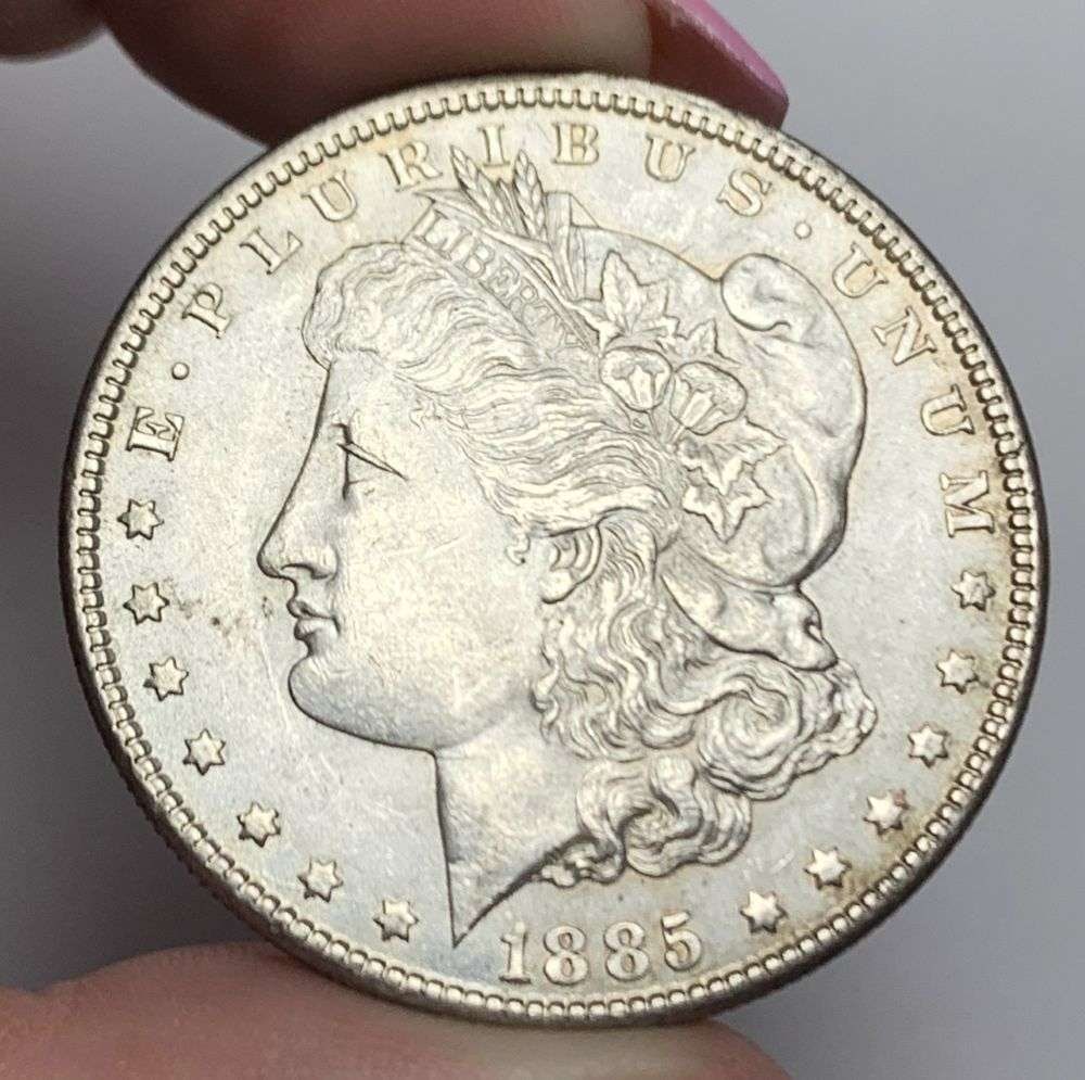 1885 Morgan Silver Dollar MS63: This consignment, we hope to offer over time across our various Whatnot channels, with the best material featured in our Wednesday auctions. We hope to be done with this stuff by the beginning of 2027