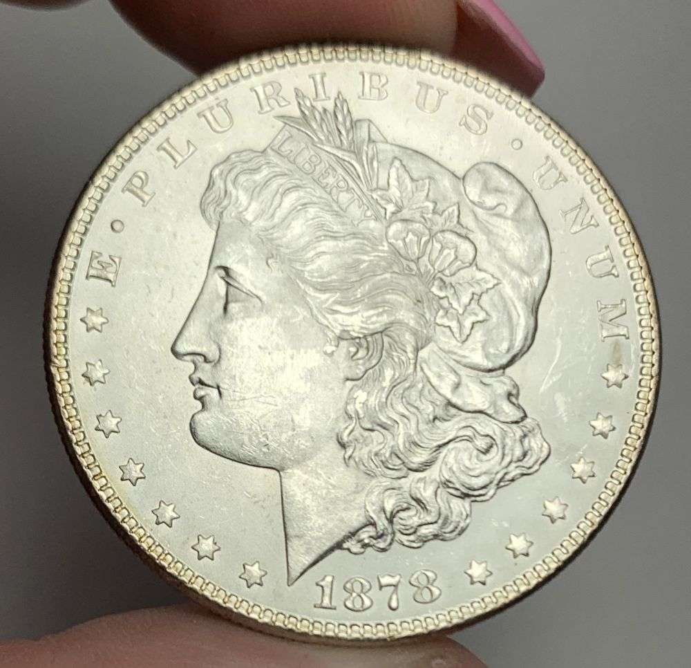 1878 Morgan Silver Dollar MS64: This is (1) coin from a book that we received along with the heavy black book of silver dollars. Winner shall receive the exact coin shown here. (MR/EB)