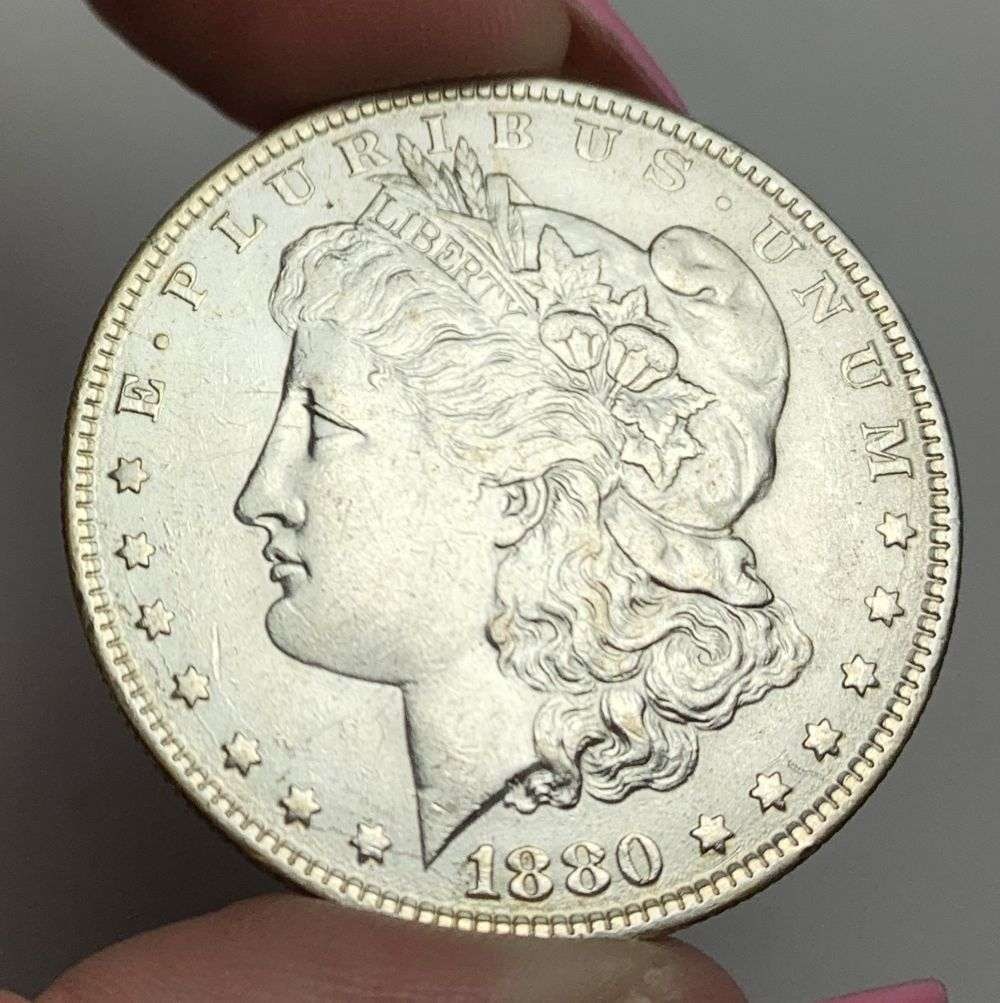 1880-O Morgan Silver Dollar MS63 Details: This is (1) coin from a book that we received along with the heavy black book of silver dollars. Winner shall receive the exact coin shown here. (MR/EB)