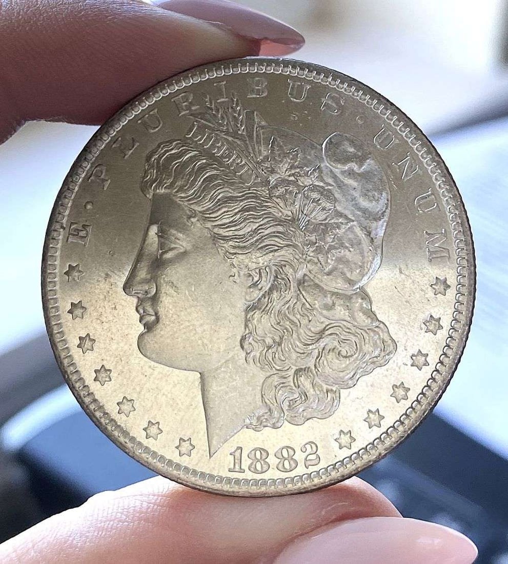 1882-CC Morgan Silver Dollar MS67 PL Details: This is (1) coin from a book that we received along with the heavy black book of silver dollars. Winner shall receive the exact coin shown here. (MR/LBB)