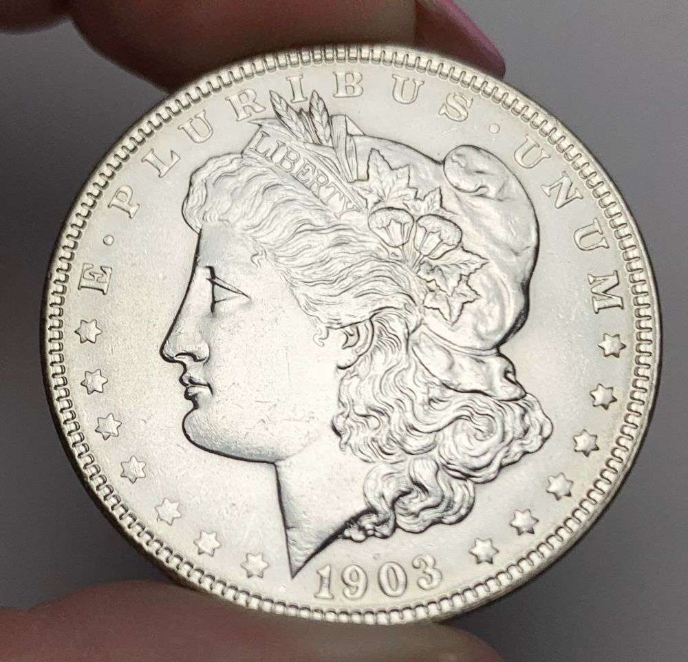 1903 Morgan Silver Dollar MS64 Details: This is (1) coin from a book that we received along with the heavy black book of silver dollars. Winner shall receive the exact coin shown here. (MR/PB)